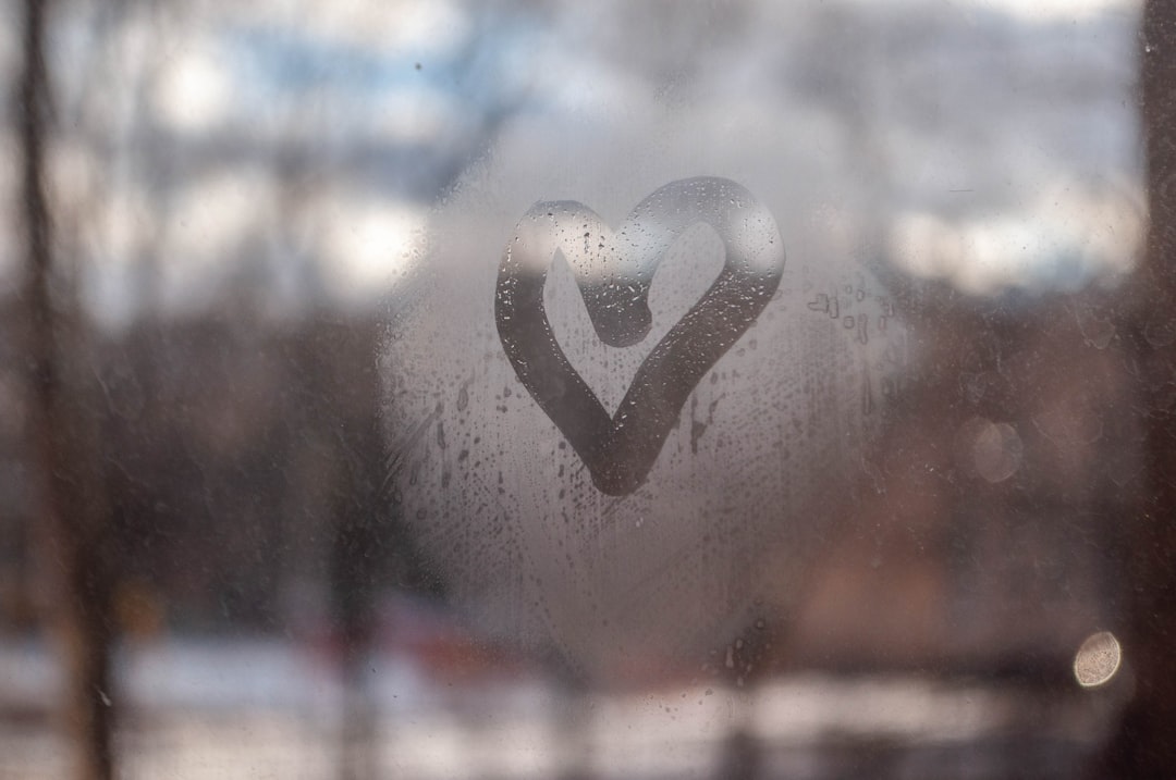 A window with a heart drawn on it