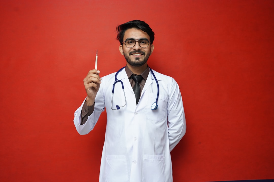 a doctor holding a syringe