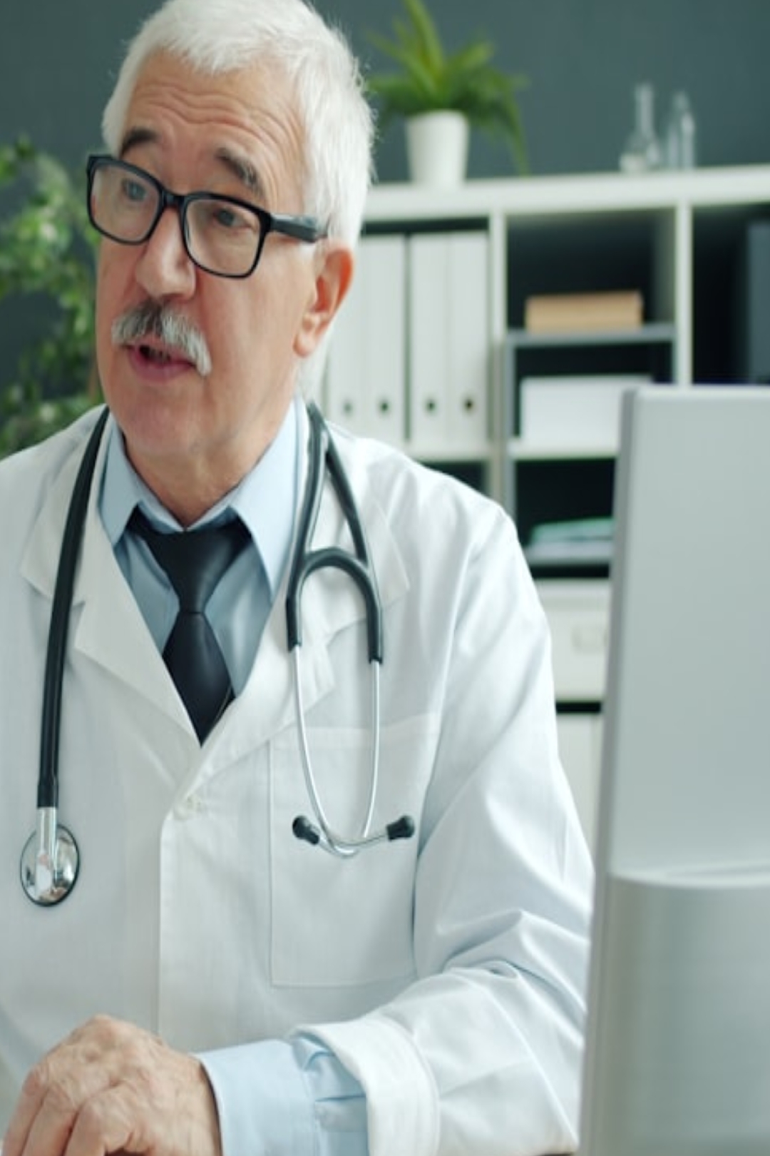 grayscale photo of person wearing ring