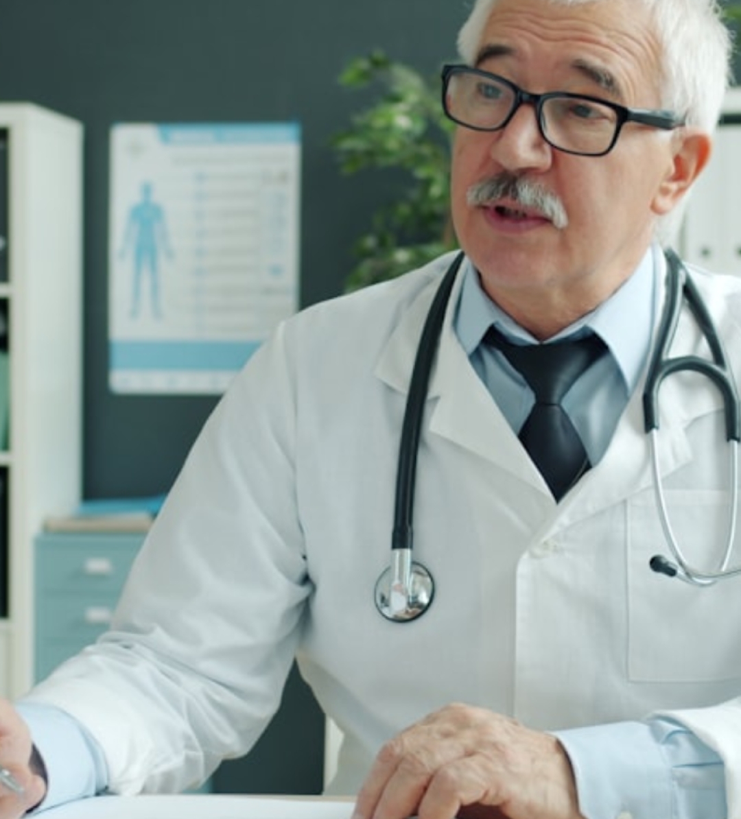 man in black jacket and black pants standing beside yellow car