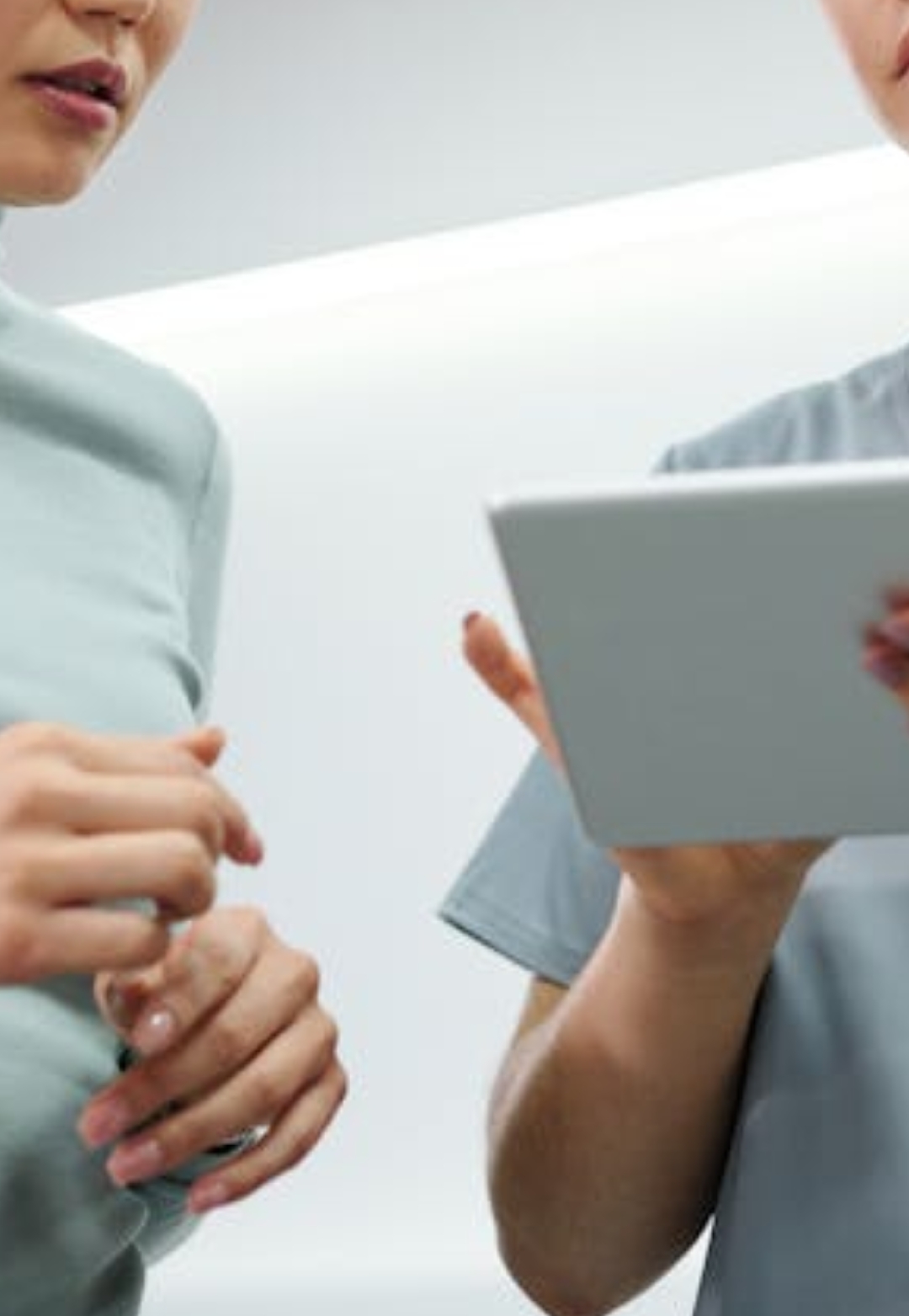 brown table lamp turned on near glass window