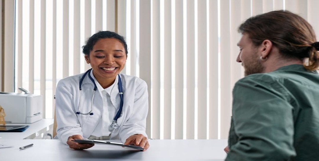 a red car parked in front of a home depot