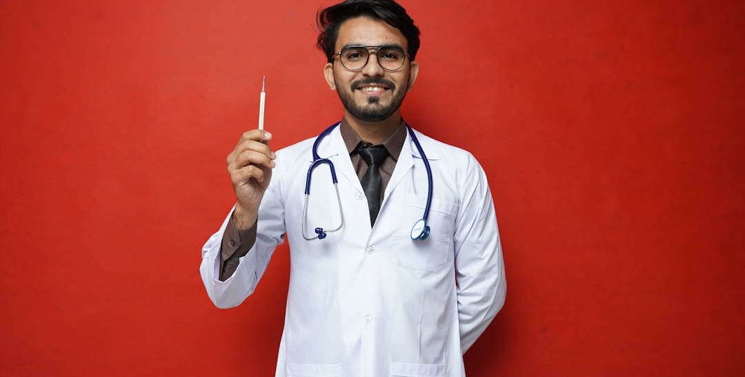 a red car parked in front of a home depot