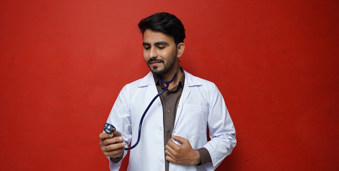 a red car parked in front of a home depot