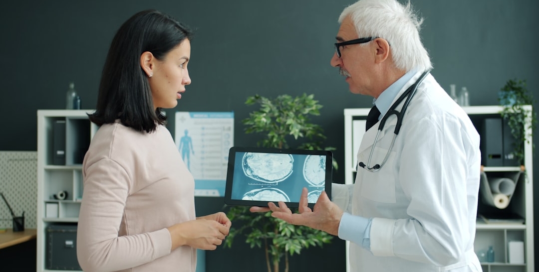 a red car parked in front of a home depot