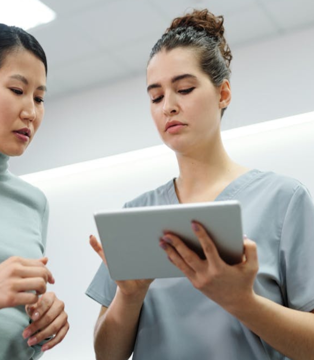 a nintendo wii game system with an orange background