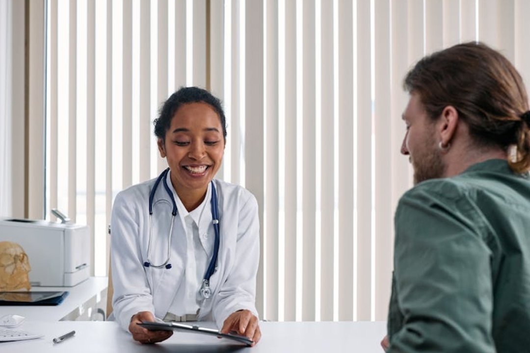 a group of people sitting around a table
