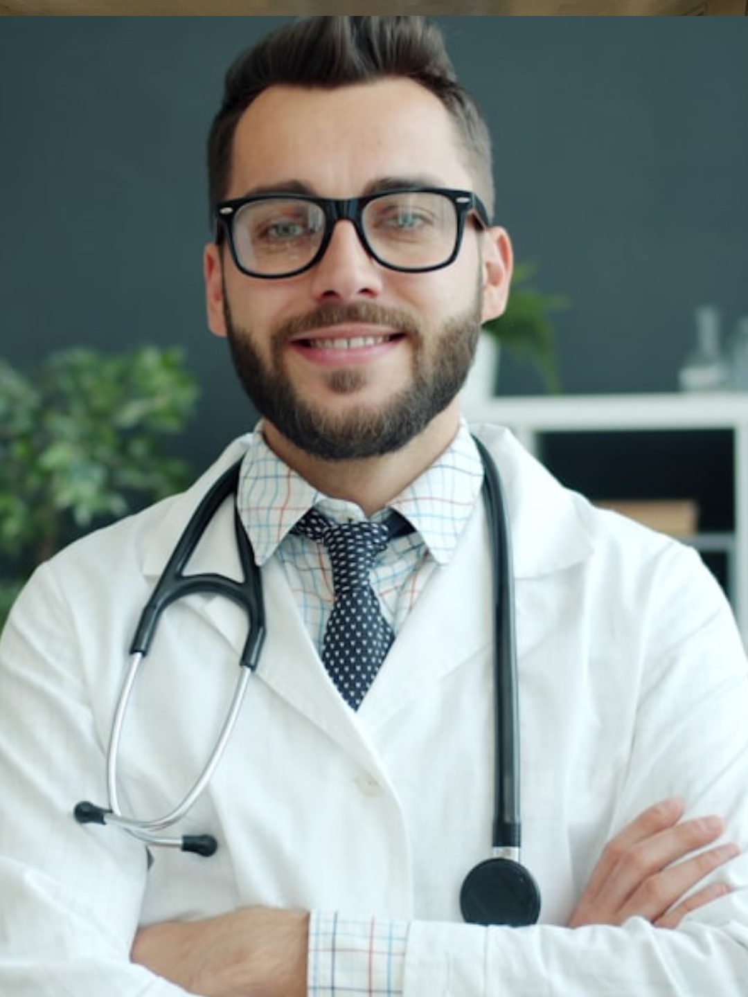 an orange cat laying on top of a metal table