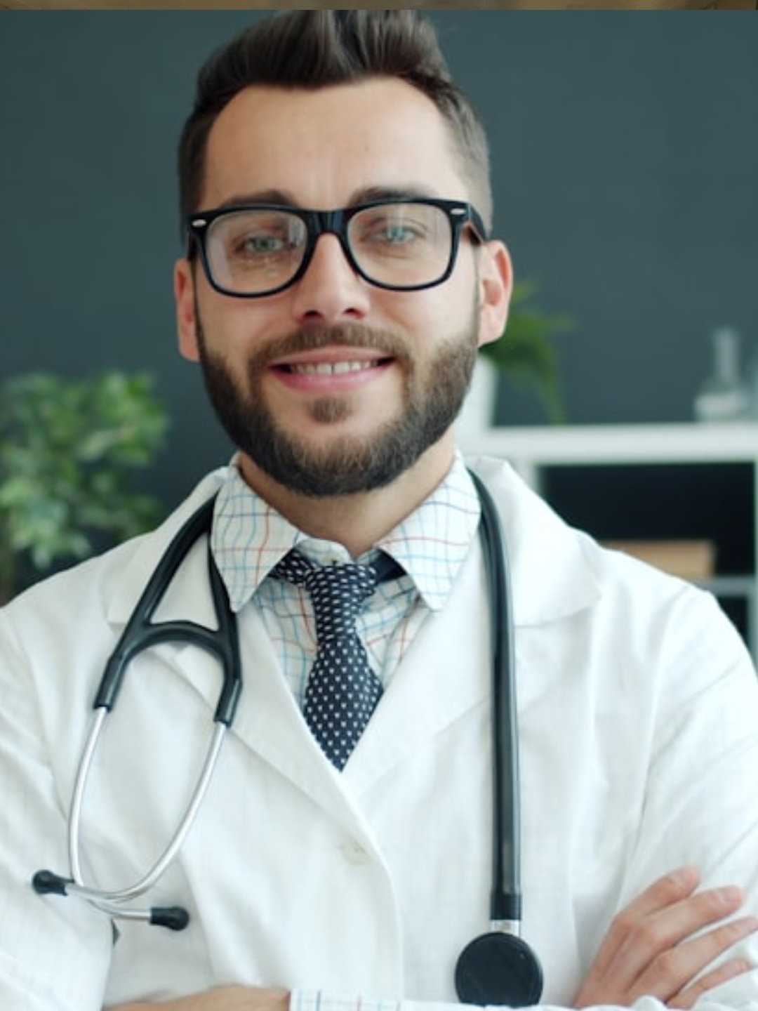 an orange cat laying on top of a metal table
