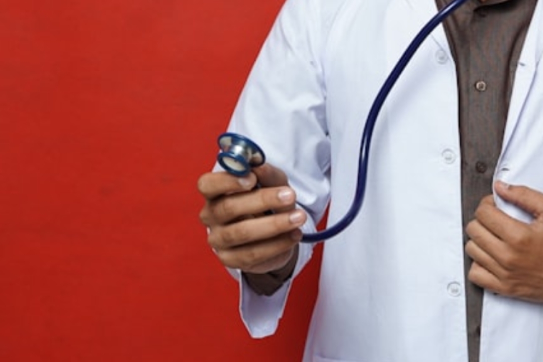 woman in black and white stripe tank top