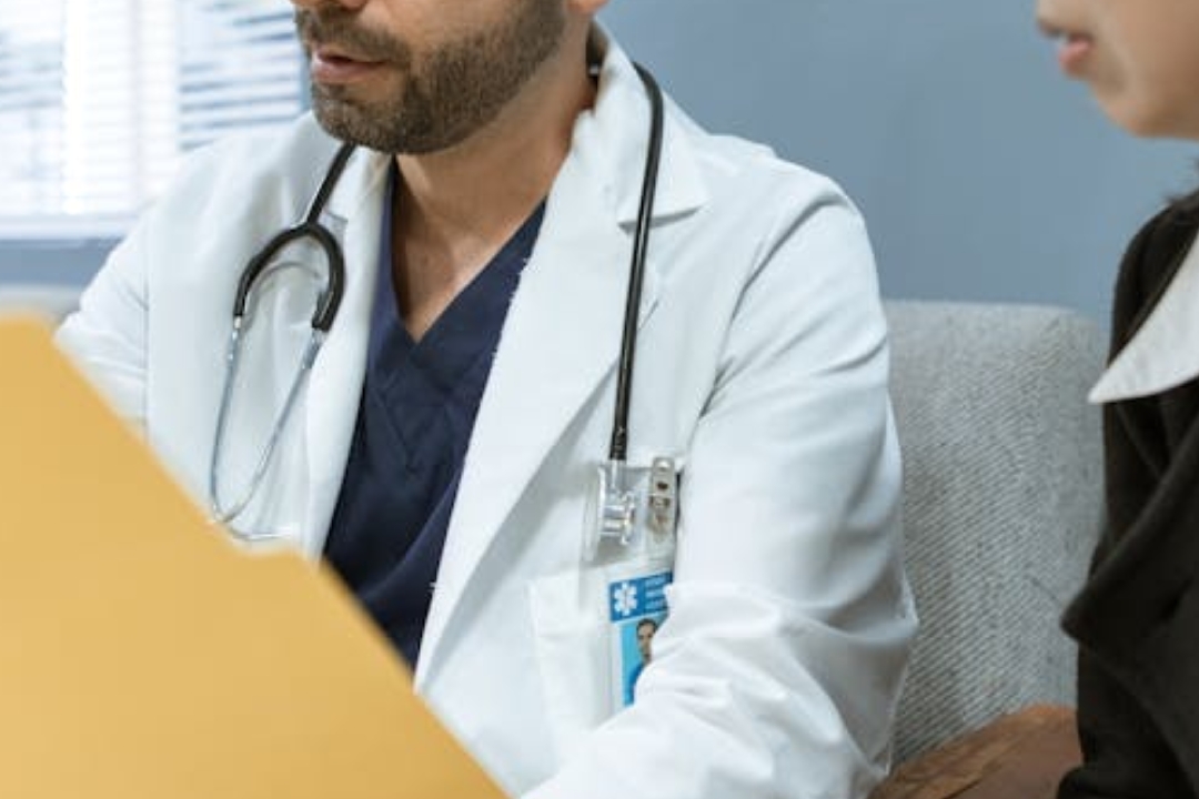 naked woman lying on bed during daytime
