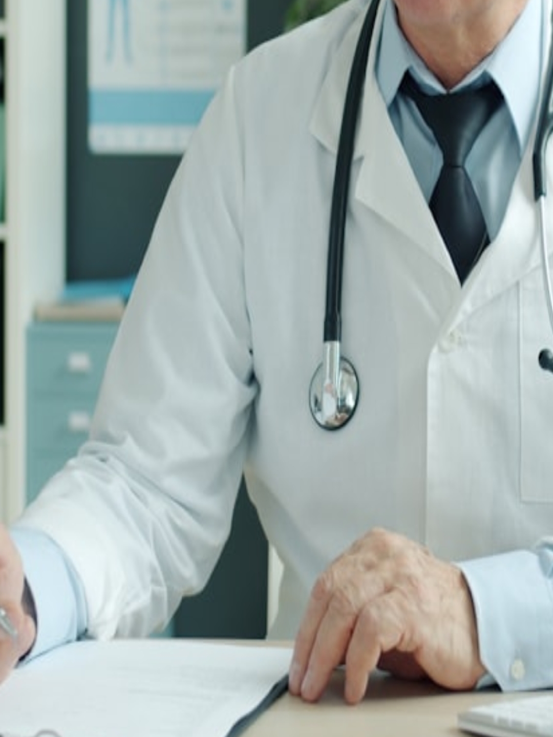 an unmade bed with a brown comforter and pillows